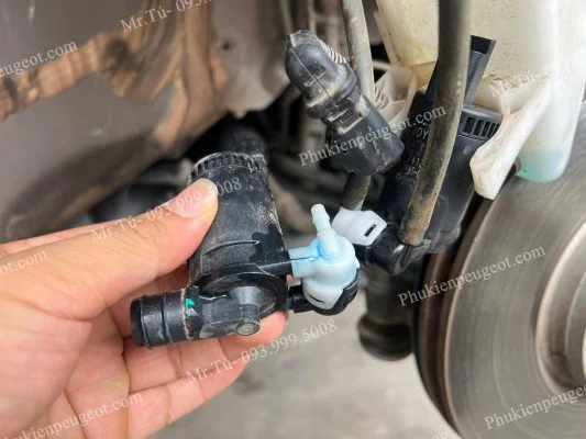 Motor bơm nước rửa kính xe Peugeot